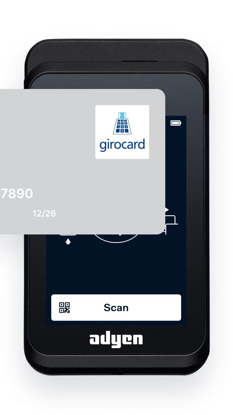 Terminal de pago Adyen que muestra una opción de pago girocard en pantalla.